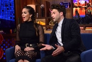 Katie Maloney and Tom Schwartz sitting together at the Watch What Happens Live clubhouse in New York City.