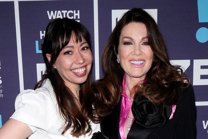 Ann Maddox and Lisa Vanderpump in front of the Watch What Happens Live step and repeat.