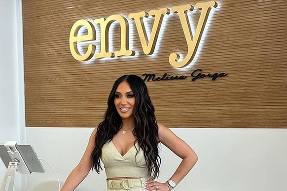 Melissa Gorga at the cash register in her Envy Long Island location.