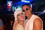 Ariana Madix and Daniel Wai smile together at The Governors Ball Music Festival in New York City.