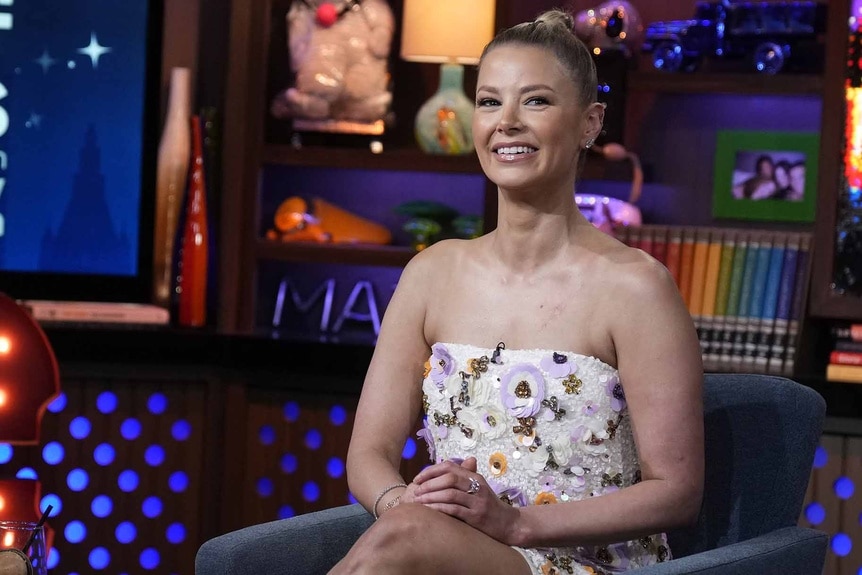 Ariana Madix smiles in a floral dress at Watch What Happens Live.