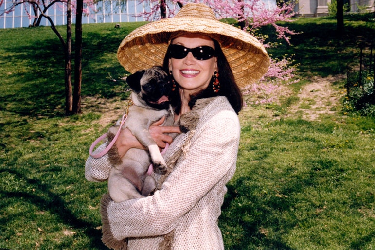 Patricia Altschul poses with her beloved pug, Chauncey.