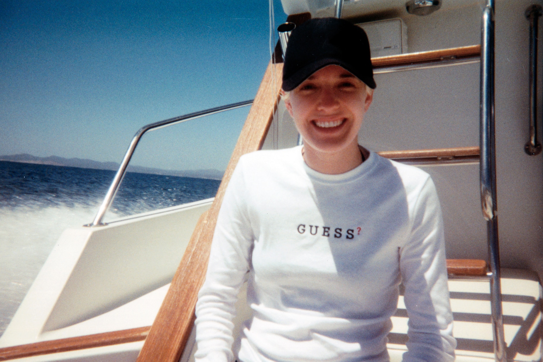 Erika Jayne smiling on a boat