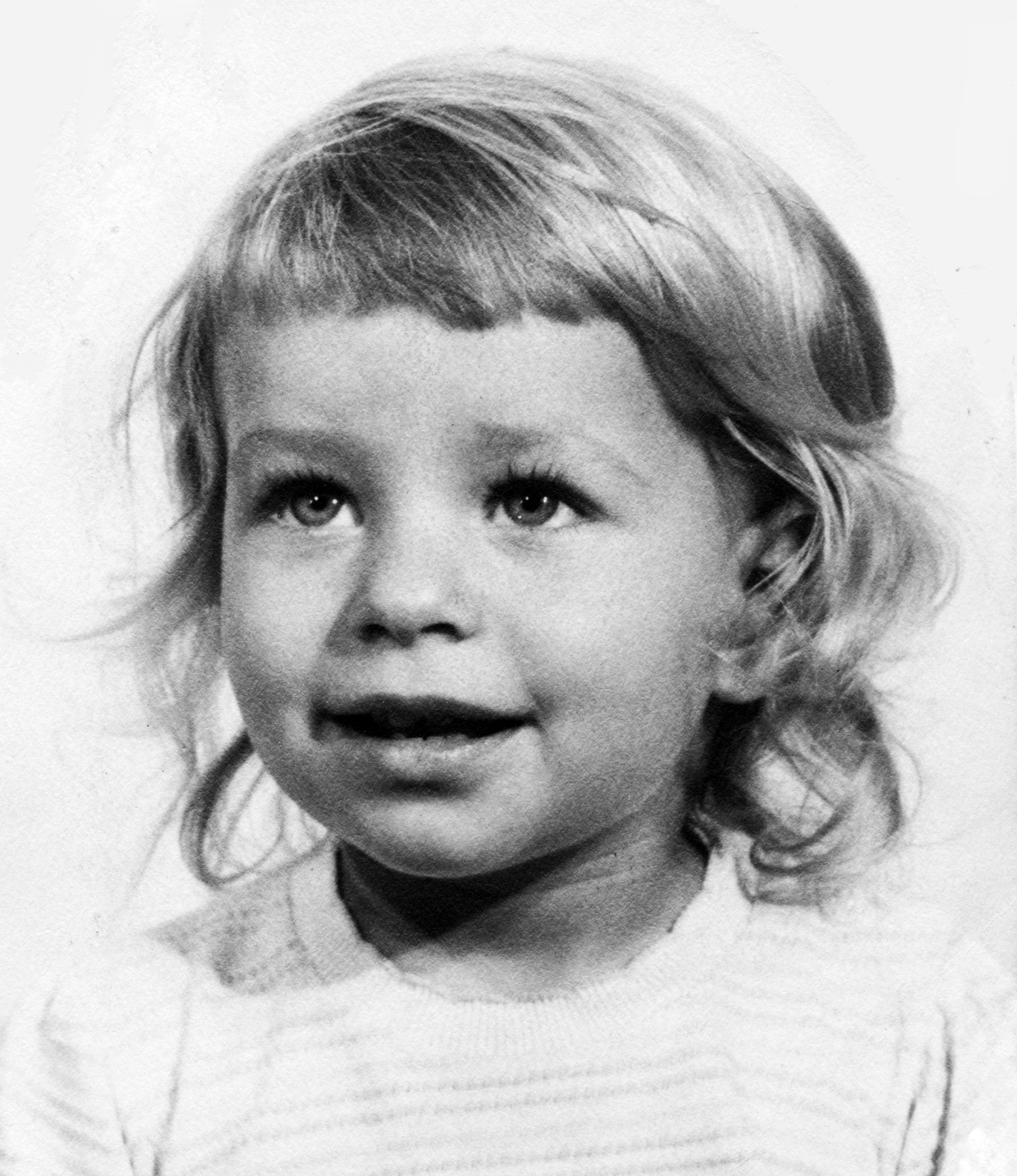 Headshot of Eileen Davidson as a little girl smiling