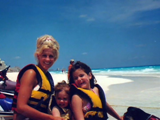 Kim Zolciak on a jet ski with her daughters Brielle and Ariana