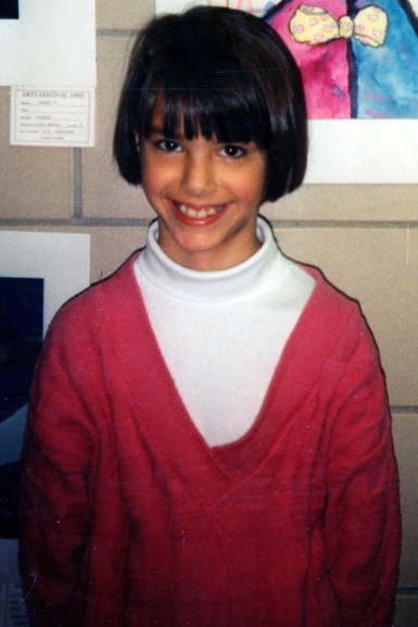 Kristen Doute smiles at school.