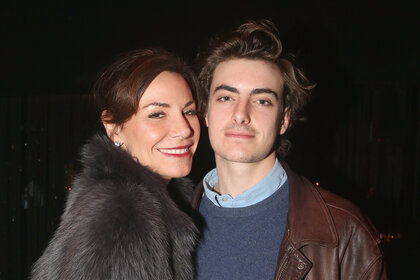 Luann De Lesseps and Noel De Lesseps pose together at an event.