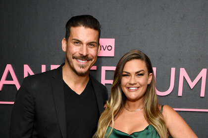 Jax Taylor and Brittany Cartwright pose for a photo on the Vanderpump Rules Season 10 Reunion Watch Party red carpet.