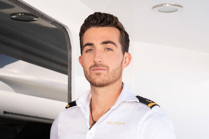 Max Holtz in his yacht uniform for Below Deck Mediterranean Season 8.