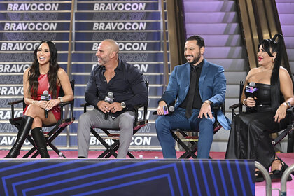 Mercedes "MJ" Javid, Melissa Gorga, Joe Gorga, and Josh Altman laughing during a panel at BravoCon 2023