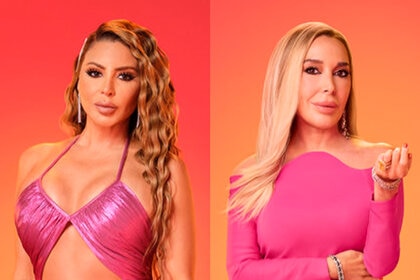 Larsa Pippen and Marysol Patton of The Real Housewives of Miami wear hot pink in front of an orange background.