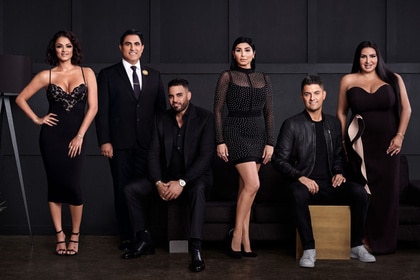 Shahs Of Sunset cast wearing all black in front of a black wall