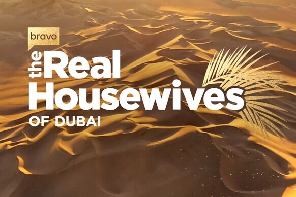 The Real Housewives of Dubai Logo over sand dunes
