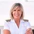 Captain Sandy wearing her yachting uniform.