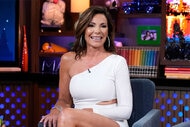 Luann De Lesseps smiling while being interview on Watch What Happens Live