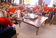The cast of Below Deck Mediterranean sits on couches in uniform in episode 816.