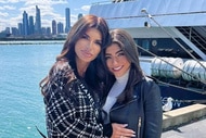 Teresa Giudice and Milania Giudice posing together in front of a boat.