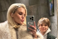 Madison LeCroy and Hudson Hughes posing together in a mirror.