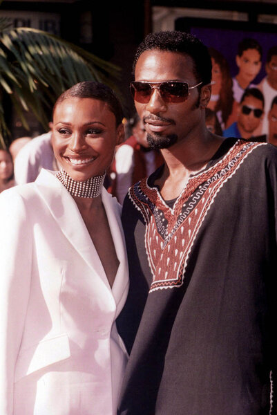 Cynthia Bailey and Leon Robinson at an event together.