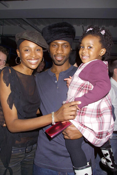 Cynthia Bailey, Leon Robinson and their daughter Noelle, at an event together.