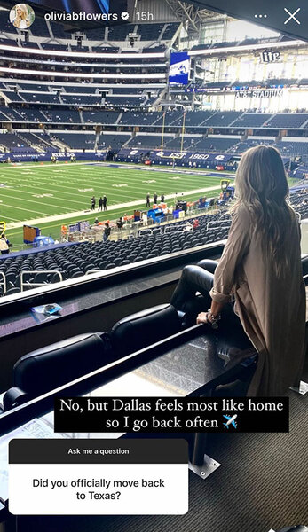 Olivia Flowers sitting in a stadium in Dallas, Texas. Overlaid text: "No, but Dallas feels most like home so I go back often [airplane emoji]".