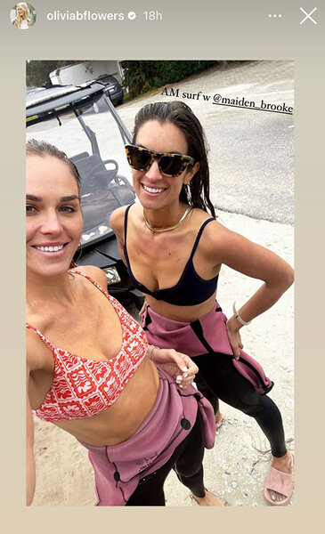 Olivia Flowers smiles with a friend wearing a patterned bikini.