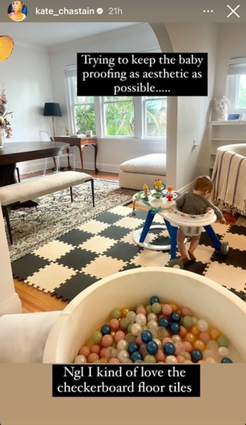 Kate Chastain's living room decor includes a play mat, a ball pit, and toys for her son, Sullivan.