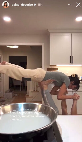 Craig Conover and Paige Desorbo playing in a kitchen together