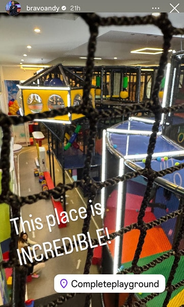 A view of an indoor kids recreation and playground space.