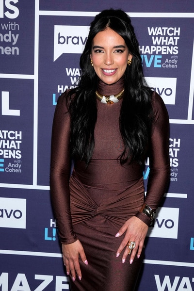 Danielle Olivera wearing a brown dress at Watch What Happens Live in New York City.