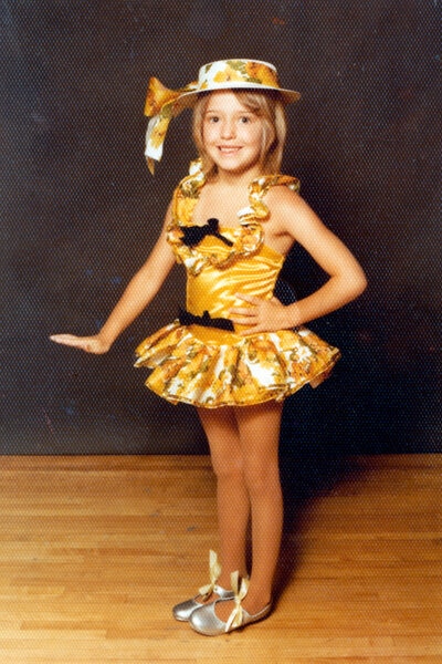 Erika Jayne wearing a dance costume as a child