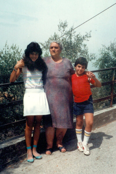 Young Joe Gorga standing with Teresa Giudice and their grandma.