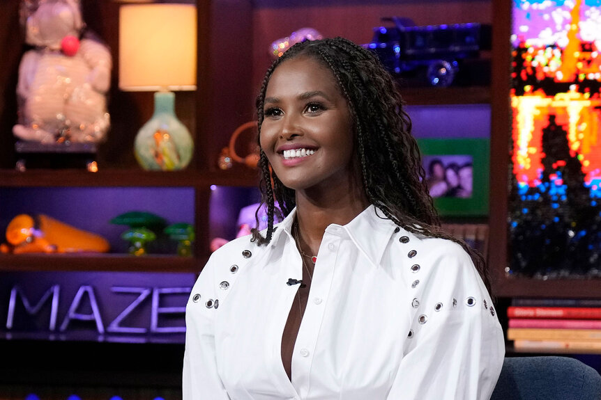 Ubah Hassan wearing a white dress while a guest on Watch What Happens Live.
