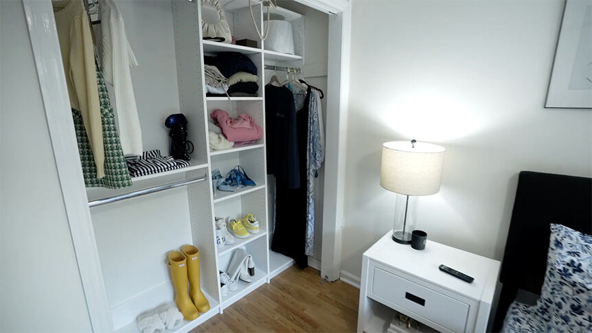 A view of Paige DeSorbo's closet and nightstand at Craig Conover's home.