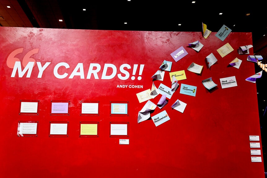 Andy Cohen's reunion cards at Bravoland at BravoCon 2023.