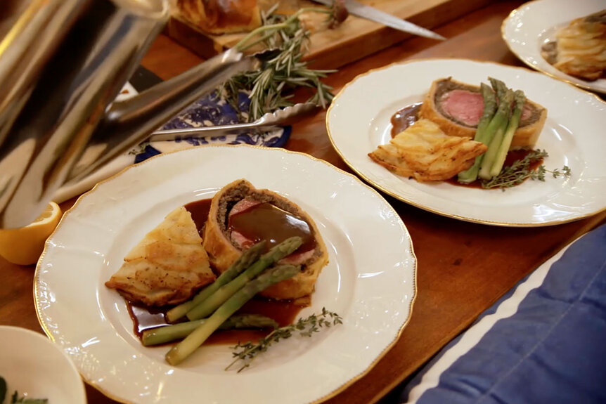 Beef Wellington being served during dinner