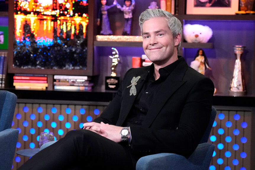 Ryan Serhant sits as a guest on Watch What Happens Live.