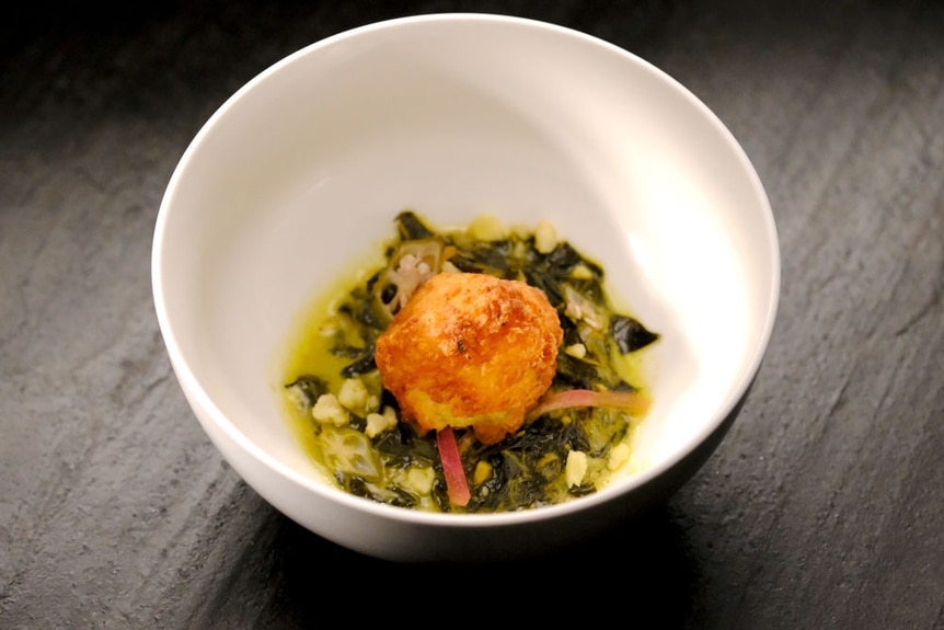 Michelle Wallace elimination winning dish of Pleasant Ridge Reserve saag paneer with collard greens & curry potato fritter