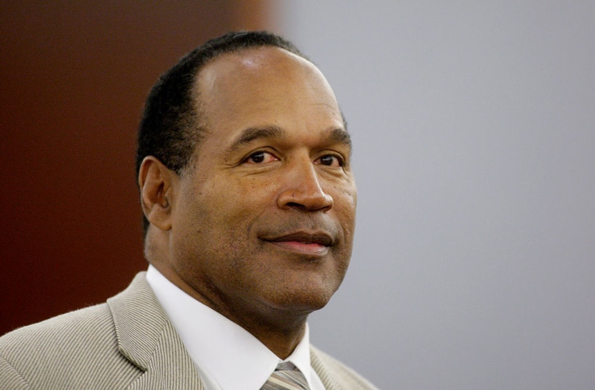 O.J. Simpson appears in District Court wearing a beige suit and tie