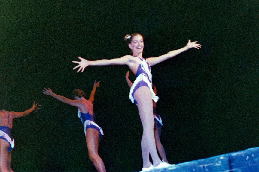Erika Jayne performing dance as a teen