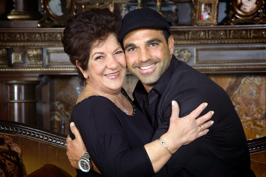 Joe Gorga hugging his mother in an all-black outfit.