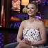 Ariana Madix smiles in a floral dress on Watch What Happens Live With Andy Cohen Episode 21076.