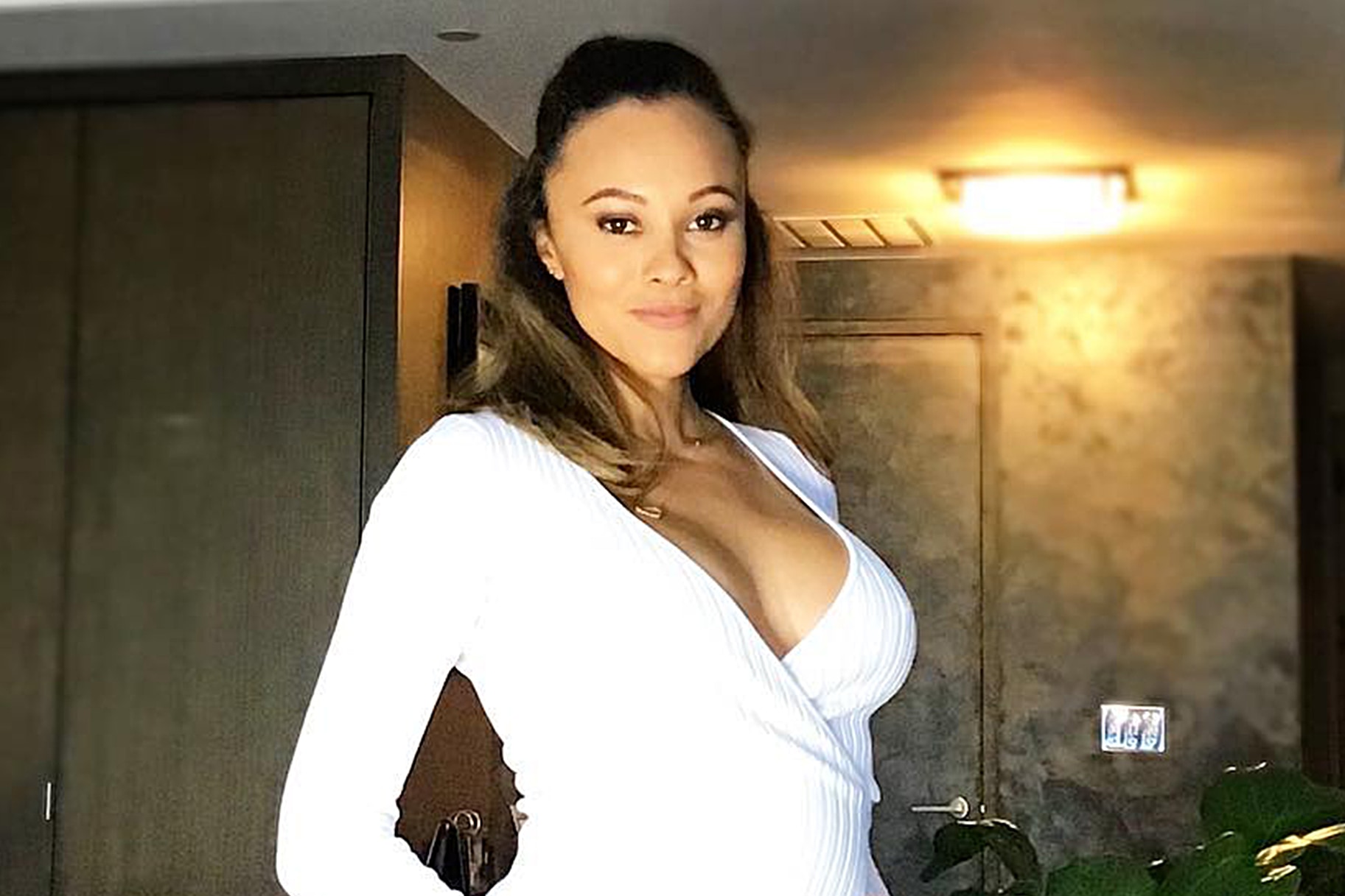 Ashley Darby Dresses Baby Bump in a Pink Dress