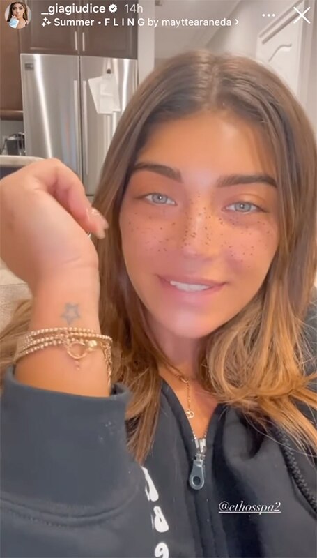 Gia Giudice showing the tattoo she will be getting removed.