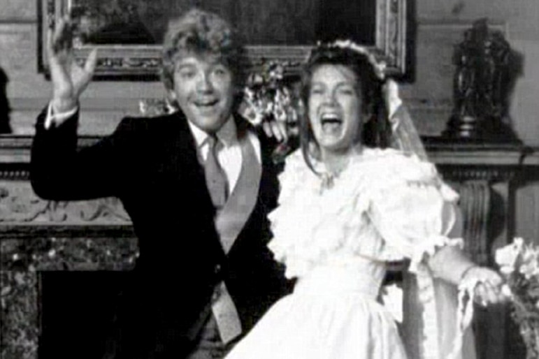 Lisa Vanderpump and Ken Todd laughing at their wedding.