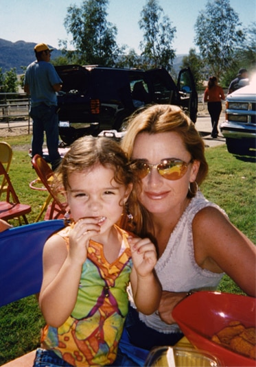 Kyle Richards seen at a picnic with one of her daughters.