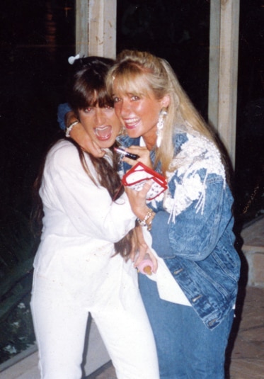 Kyle Richards with her sister, Kim Richards, laughing together.