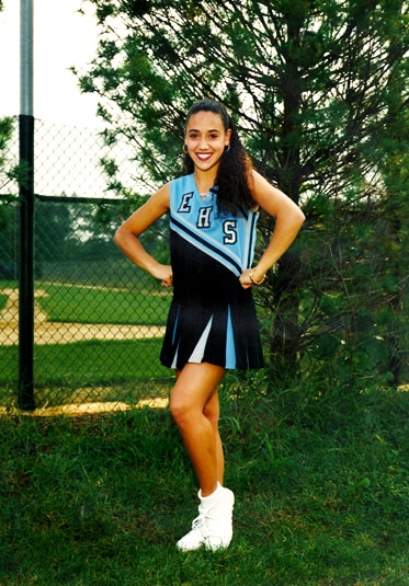 Full length of Melissa Gorga as a young girl wearing her cheer uniform