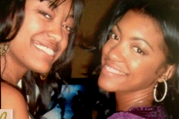 Porsha Williams smiling with her sister, Lauren Williams