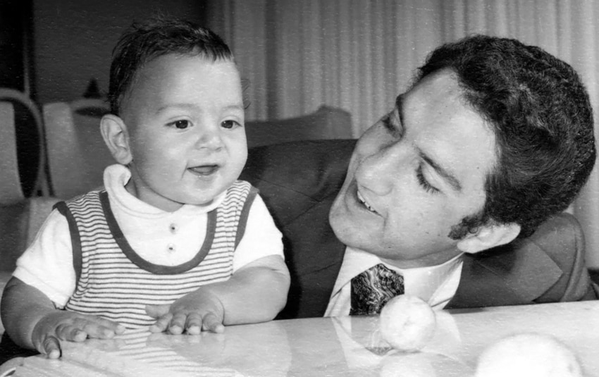 Mauricio Umansky as a baby with his father.